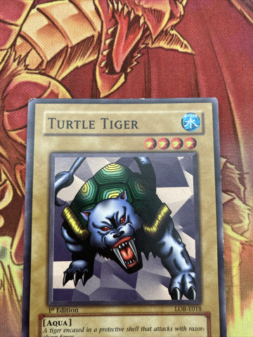 lob-e018 Turtle Tiger 1st Edition (EXC) Common Yugioh! (back)