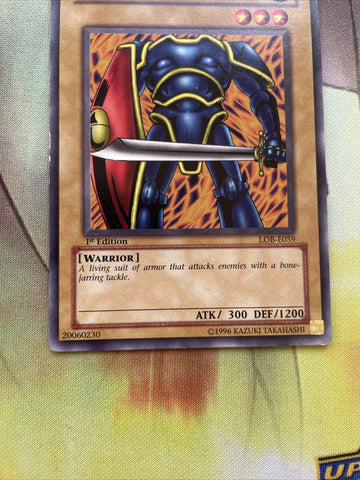 lob-e059 Hard Armor 1st Edition (NM+) Common Yugioh! (back)