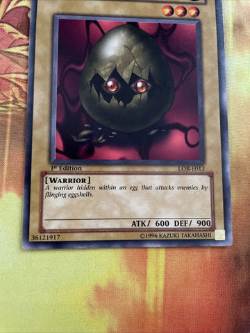 lob-e013 Monster Egg 1st Edition (VG+/NM) Common Yugioh! (back)