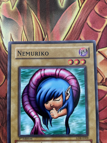 LOB-E009 YuGiOh Nemuriko 1st Edition (back)