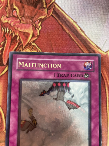 SOI EN060 Yugioh | Malfunction | Ultimate Rare LP Yugioh card (back)