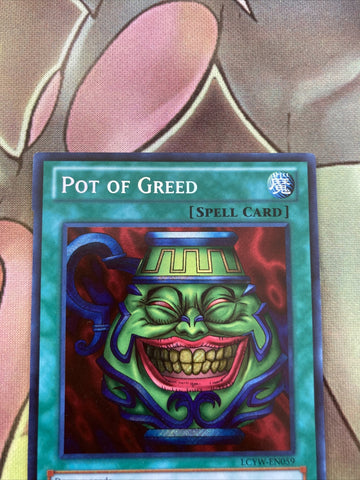 LCYW-EN059 Pot of Greed Yugioh! MISPRINT? TOP BOTTOM LEFT CARD CUT INCORRECTLY (back)