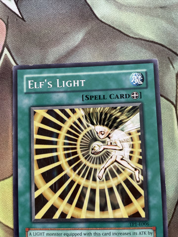 TP1 E006 Yugioh | Elf's Light | Rare LP Condition Yugioh Card (back)
