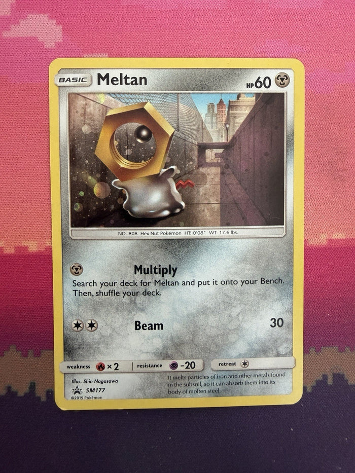 Pokemon Card Meltan Black Star Promo Cosmo Holo SM117 Near Mint