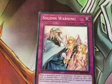 SR05-EN037 Solemn Warning Common Yugioh Card 1st Edition NM (back)
