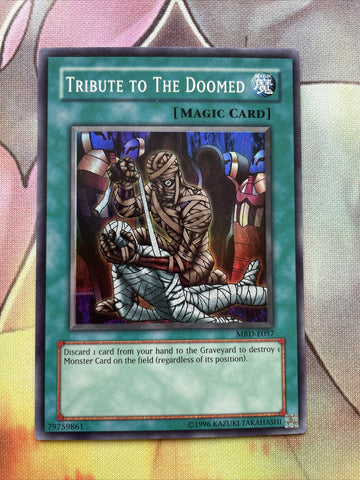 MRD-E057 Tribute To The Doomed - Unlimited - Super - Yugioh