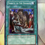 MRD-E057 Tribute To The Doomed - Unlimited - Super - Yugioh