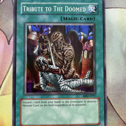 MRD-E057 Tribute To The Doomed - Unlimited - Super - Yugioh