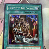 MRD-E057 Tribute To The Doomed - Unlimited - Super - Yugioh