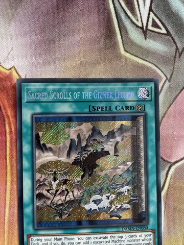 DAMA-EN060 Sacred Scrolls of the Gizmek Legend Secret Rare | YuGiOh Trading Card (back)