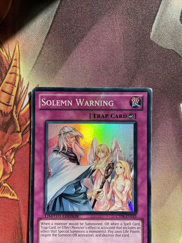 CT08-EN015 Solemn Warning Super Rare Played Condition Yugioh! Card (back)