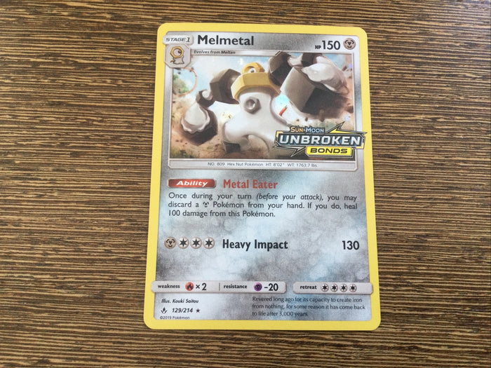 Pokemon Card MELMETAL 129/214 Unbroken Bonds Logo Stamped Promo
