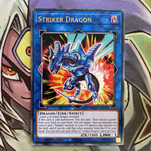 MGED-EN145 Striker Dragon Gold Rare 1st Edition NM Yugioh Card
