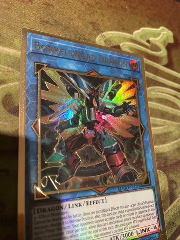 MAGO-EN039 Borrelsword Dragon 1st Edition Gold Rare Yugioh Card (back)