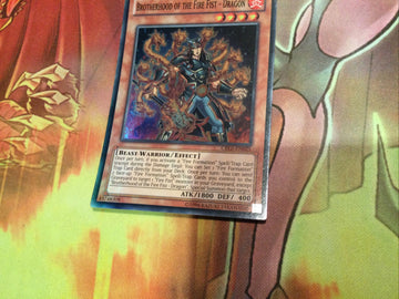 CBLZ-EN025 BROTHERHOOD OF THE FIRE FIST- DRAGON Super Rare UNL Ed YuGiOh Card (back)