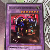 DB2-EN012 YUGIOH THE LAST WARRIOR FROM ANOTHER PLANET SUPER RARE LP