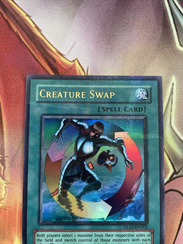 HL03-EN002 Yugioh! Creature Swap parallel rare near mint (back)