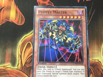 LCYW-EN122 Puppet Master - Common 1st Edition Yugioh (back)