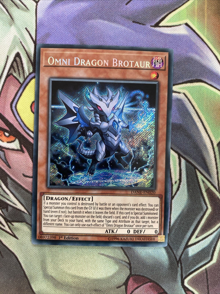 DANE-EN020 Omni Dragon Brotaur Secret Rare 1st Edition NM Yugioh Card