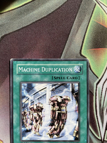 SDMM-EN026 Machine Duplication Common 1st Edition Yugioh Card played (back)