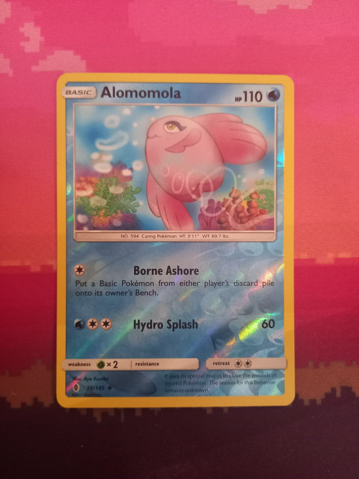 Pokemon card Alomomola 36/145 Reverse Holo Guardians Rising Near Mint