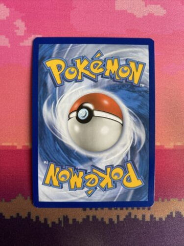 Pokemon Card Axew Unified Minds Reverse Holo Common 154/236 Near Mint (back)