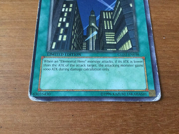 GLD2-EN038 Yugioh Limited Edition Good Condition Common Spell Skyscraper! (back)