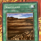 LOB-E037 Wasteland Common 1st Edition Near Mint Condition Yugioh