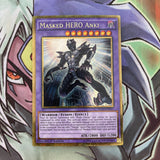 PGL2-EN011 Masked Hero Anki Gold Secret Rare 1st Edition NM Yugioh Card