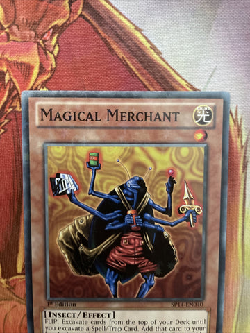 SP14-EN040 Magical Merchant Starfoil Rare 1st Edition Yugioh Card (back)