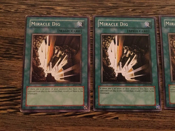 LON-100  3x Miracle Dig YuGiOh Playset (back)