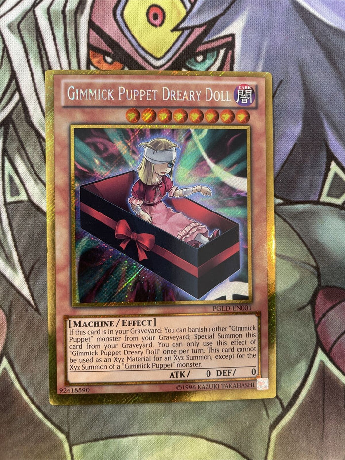 PGLD-EN001 Gimmick Puppet Dreary Doll - Gold Rare -  NM Yugioh Card