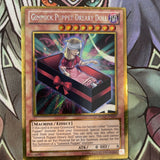 PGLD-EN001 Gimmick Puppet Dreary Doll - Gold Rare -  NM Yugioh Card