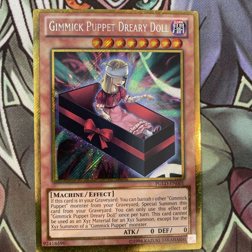 PGLD-EN001 Gimmick Puppet Dreary Doll - Gold Rare -  NM Yugioh Card