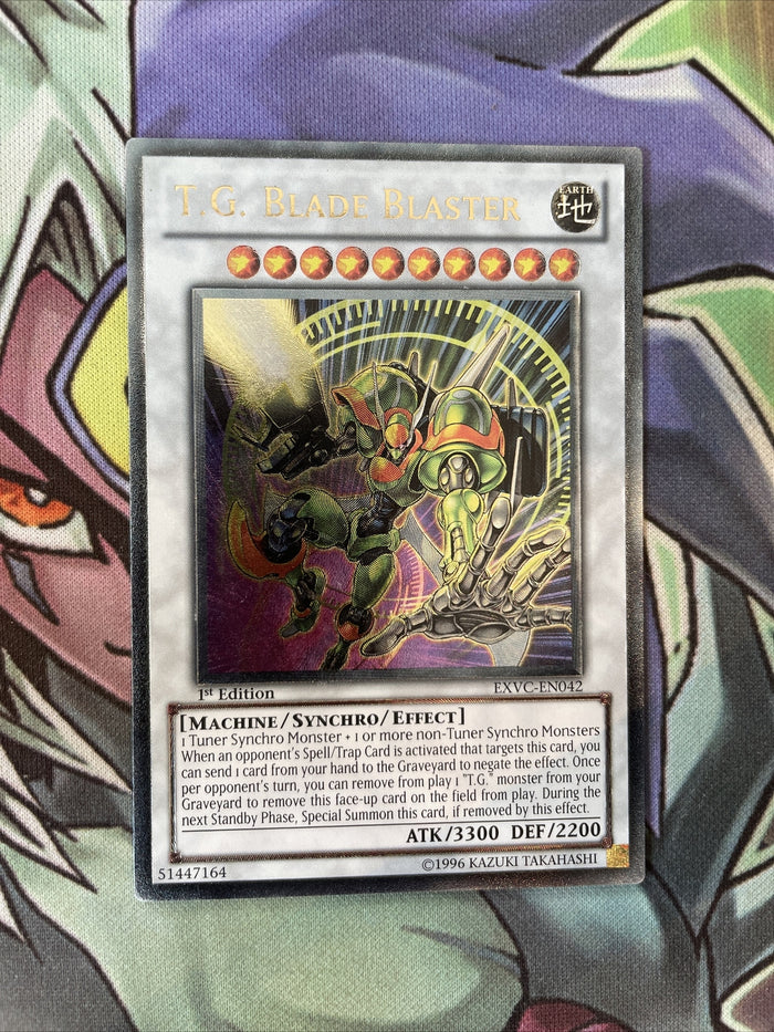 EXVC-EN042 T.G. Blader Blaster Ultimate Rare 1st Edition NM Yugioh Card