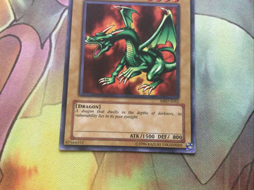 MRD-E062 BLACKLAND FIRE DRAGON UNL EDITION YUGIOH CARD (back)