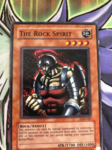 LON-069/DB2 The Rock Spirit - Mixed Editions - Common - YuGiOh (back)