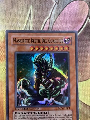 TAEV-ENSE1 Masked Beast Des Gardius, Limited Edition Yugioh Card, Super GERMAN (back)