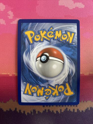 Pokemon Card Rowlet Cosmic Eclipse Reverse Holo 17/236 Near Mint (back)